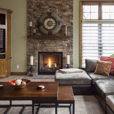 Sofa, television and fireplace in living room